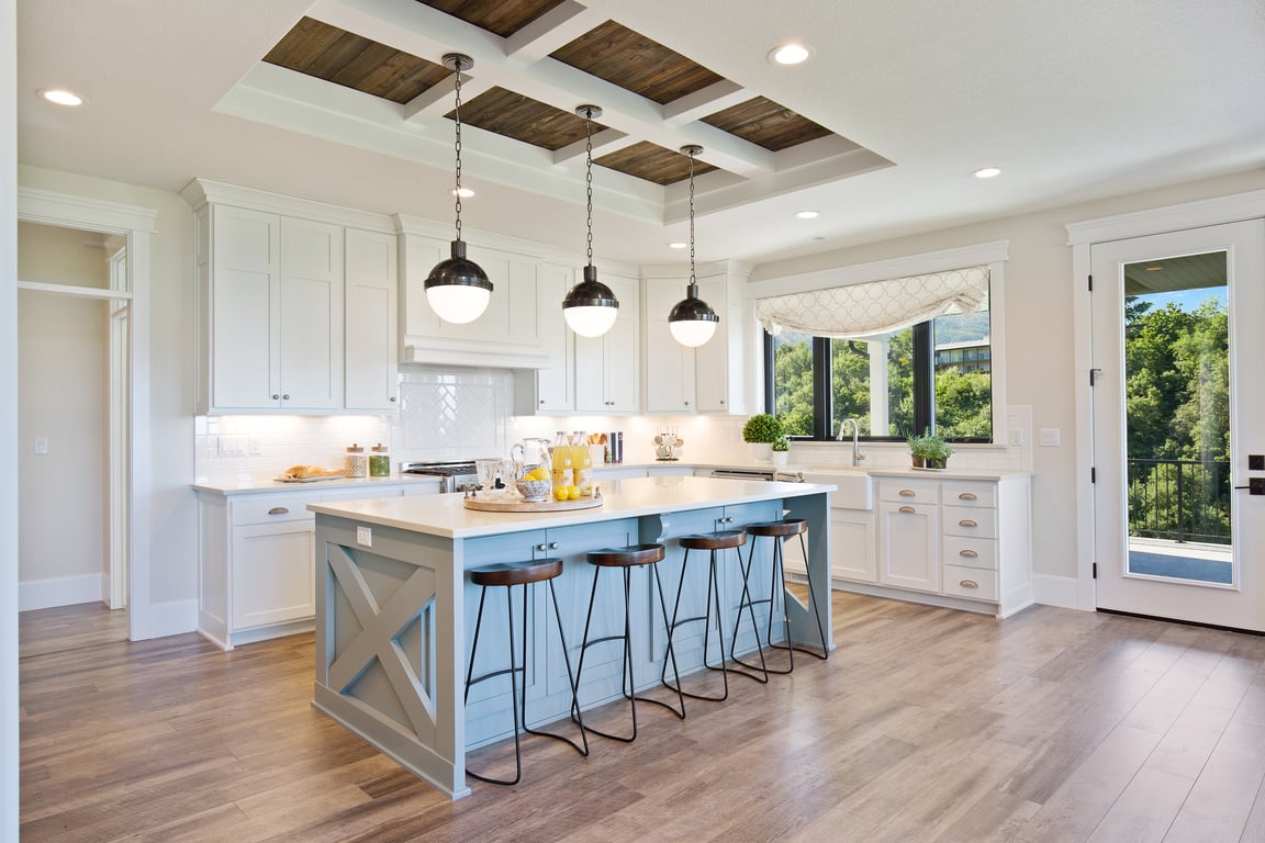 White gourmet kitchen with farmhouse sink